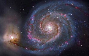 M51 com sua galáxia satélite à esquerda